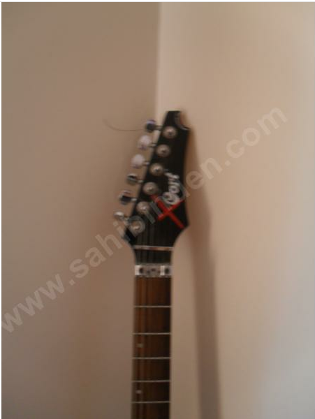  Bu gitar Cort un hangi modeli(Aciliyet içerir)