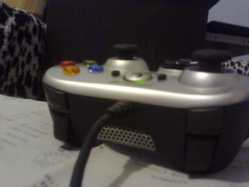  Logitech ChillStream (El soğutmalı gamepad - PC için)