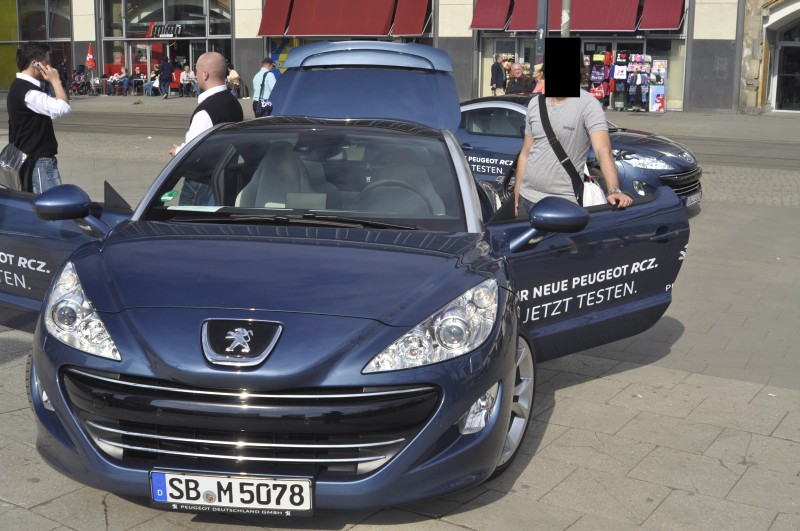  Peugeot RCZ hakkında sorularınızı cevaplayabilirim.