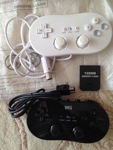  Wİİ SPORT RESORT PACK+RESİDENT EVİL REMAK+128 MB GAMECUBE MEMORYCARD+2 ADET Wİİ CONTROLLER .. 250 tl