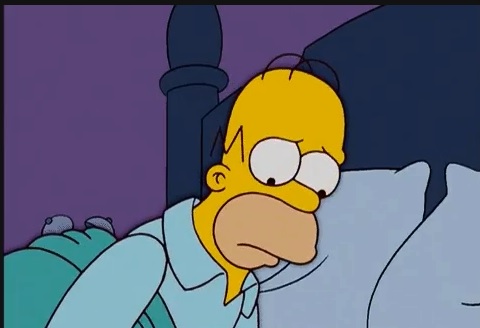 Homer Simpson'un çerçeveye baktığı caps
